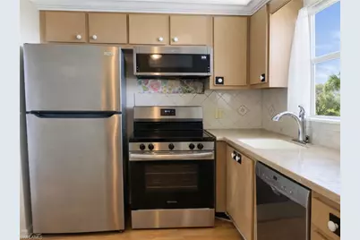 4380 27th St SW #407, Naples, FL 34116 - Photo 2