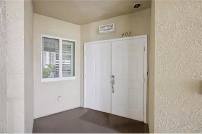 7687 Pebble Creek Cir #403, Naples, FL 34108 - Photo 6