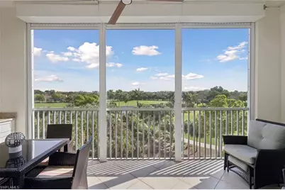 7687 Pebble Creek Cir #403, Naples, FL 34108 - Photo 2