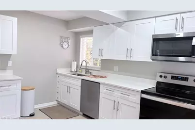 59 Camelot Gardens Blvd #110, Lehigh Acres, FL 33936 - Photo 8