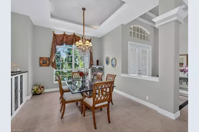 5875 Whisperwood Ct, Naples, FL 34110 - Photo 8
