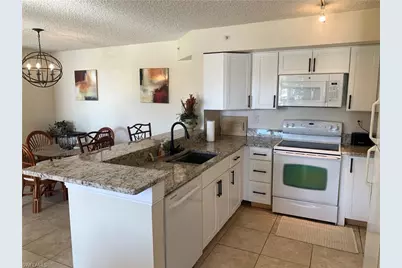 1275 Wildwood Lakes Blvd #2-108, Naples, FL 34104 - Photo 8