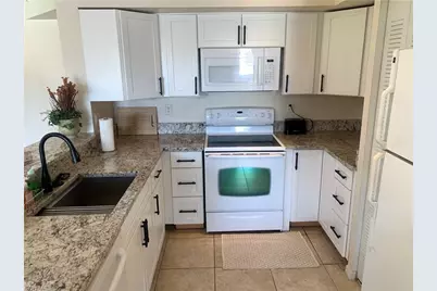 1275 Wildwood Lakes Blvd #2-108, Naples, FL 34104 - Photo 6