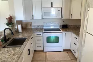 1275 Wildwood Lakes Blvd, Naples, FL 34104 - Photo 6