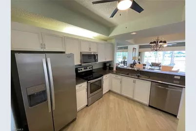 1070 Woodshire Ln #E204, Naples, FL 34105 - Photo 6