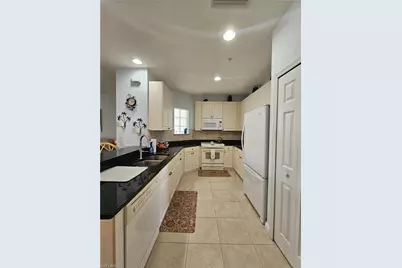 1405 Sweetwater Cv #204, Naples, FL 34110 - Photo 6