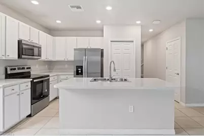 15245 Wildflower Cir, Naples, FL 34119 - Photo 8