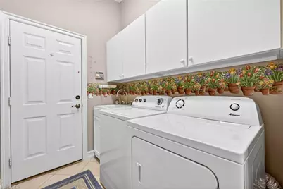 21863 Masters Cir, Estero, FL 33928 - Photo 24