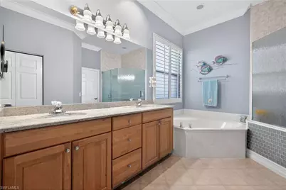 21863 Masters Cir, Estero, FL 33928 - Photo 16