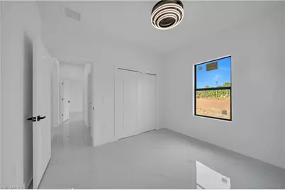 704 Holmes Ave, Lehigh Acres, FL 33974 - Photo 16