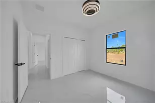 704 Holmes Ave, Lehigh Acres, FL 33974 - Photo 16