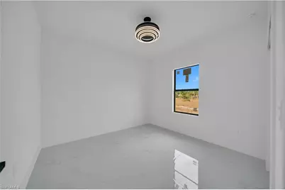 704 Holmes Ave, Lehigh Acres, FL 33974 - Photo 10