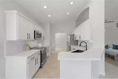 7134 Blue Juniper Ct #202, Naples, FL 34109 - Photo 4