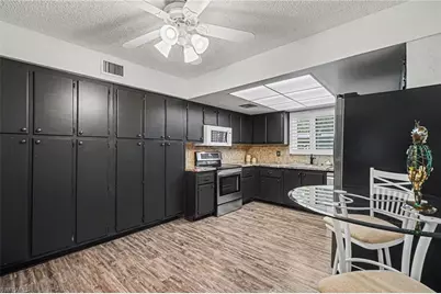 215 Cypress Way E #E2, Naples, FL 34110 - Photo 8