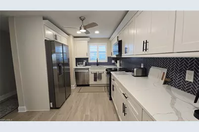 12945 Vanderbilt Dr #402, Naples, FL 34110 - Photo 16