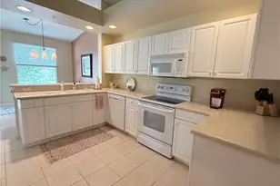 3555 Laurel Greens Ln N, Naples, FL 34119 - Photo 8