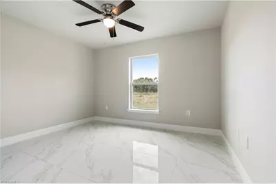 1076 Gunby Ave S, Lehigh Acres, FL 33974 - Photo 8