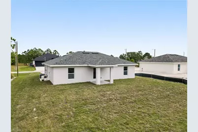 1076 Gunby Ave S, Lehigh Acres, FL 33974 - Photo 6