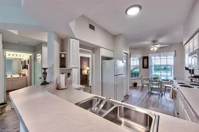 1970 Willow Bend Cir #6-102, Naples, FL 34109 - Photo 6