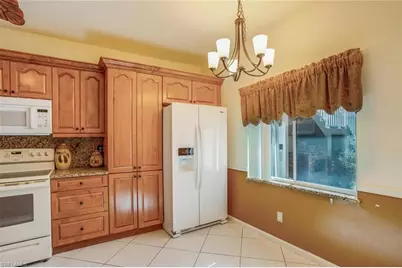 725 Saratoga Cir #A103, Naples, FL 34104 - Photo 10