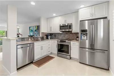 3150 Binnacle Dr SE #209 - 2J, Naples, FL 34103 - Photo 1