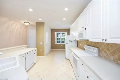 4884 Hampshire Ct #203, Naples, FL 34112 - Photo 12