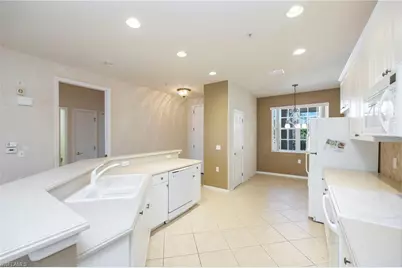 4884 Hampshire Ct #203, Naples, FL 34112 - Photo 10