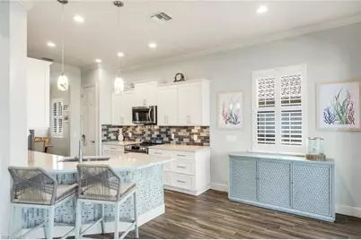 8839 Nautical Landing Cir #201, Naples, FL 34120 - Photo 12