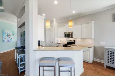 8835 Nautical Landing Cir #201, Naples, FL 34120 - Photo 16