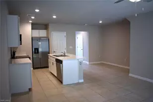 15269 Wildflower Cir, Naples, FL 34119 - Photo 8