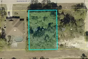 1128 Ravenswood St E, Lehigh Acres, FL 33974 - Photo 1