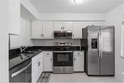 1001 Foxfire Ln #307, Naples, FL 34104 - Photo 4