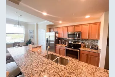 9820 Giaveno Cir #1412, Naples, FL 34113 - Photo 4