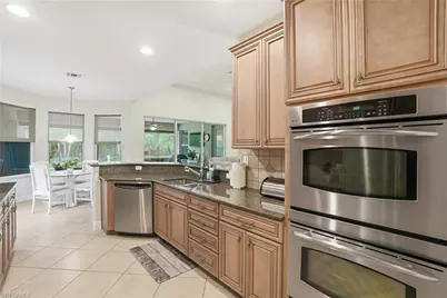 7687 Martino Cir, Naples, FL 34112 - Photo 10