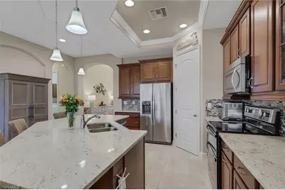 1589 Serrano Cir, Naples, FL 34105 - Photo 6