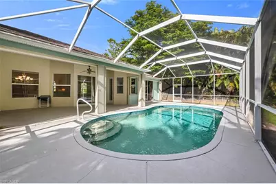 5890 Bur Oaks Ln, Naples, FL 34119 - Photo 2