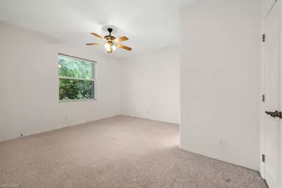 5890 Bur Oaks Ln, Naples, FL 34119 - Photo 12