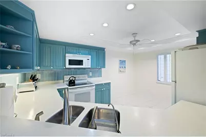 565 Beachwalk Cir #T-102, Naples, FL 34108 - Photo 10