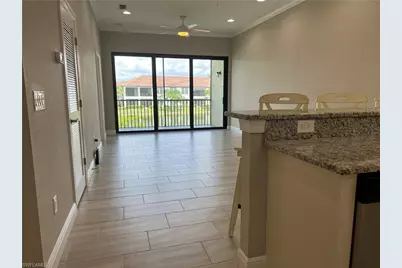 15114 Palmer Lake Cir #202, Naples, FL 34109 - Photo 4