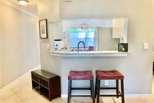 157 Wading Bird Cir, Naples, FL 34110 - Photo 2