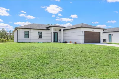 1124 Edelweiss St E, Lehigh Acres, FL 33974 - Photo 2