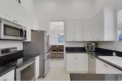 1465 Mariposa Cir #201, Naples, FL 34105 - Photo 2