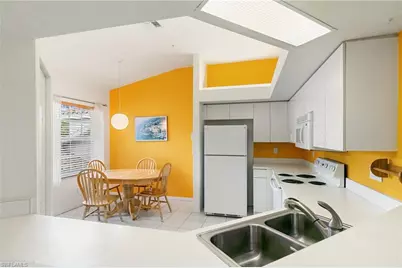 6927 Satinleaf Rd N #203, Naples, FL 34109 - Photo 10