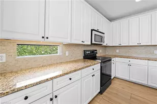 21827 Rainbow Lake Ct, Estero, FL 33928 - Photo 8