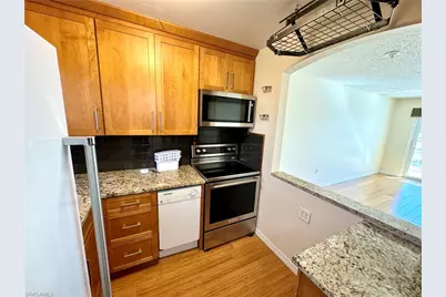 225 Turtle Lake Ct #306, Naples, FL 34105 - Photo 2