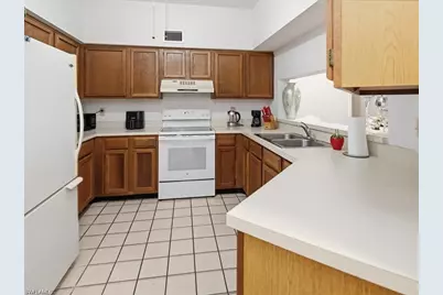 1833 Courtyard Way #E105, Naples, FL 34112 - Photo 8