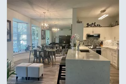 56 Silver Oaks Cir #102, Naples, FL 34119 - Photo 1