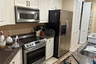 1390 Sweetwater Cove, Naples, FL 34110 - Photo 2