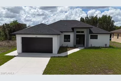 2561 25th St W, Lehigh Acres, FL 33971 - Photo 4