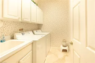 5725 Lago Villaggio Way, Naples, FL 34104 - Photo 8